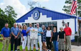Group of people outside of Blossman Gas