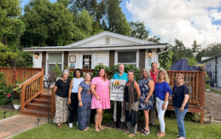 Group of people outside of Grounded Energy